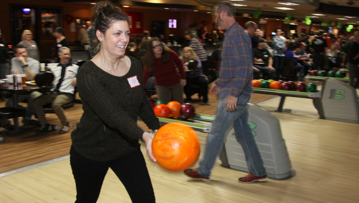 Employee bowling at Annual Party